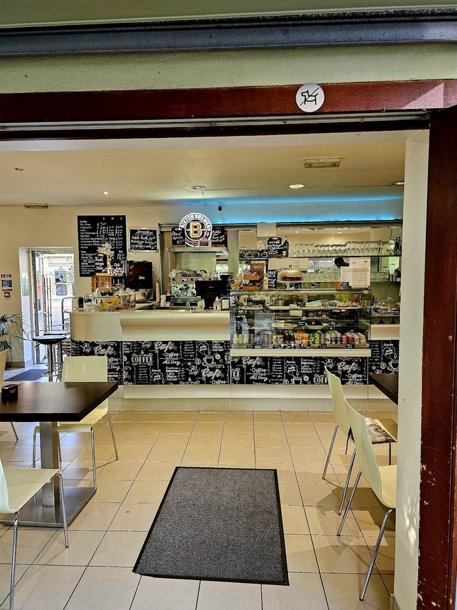 The cafe entrance looking in towards the counter