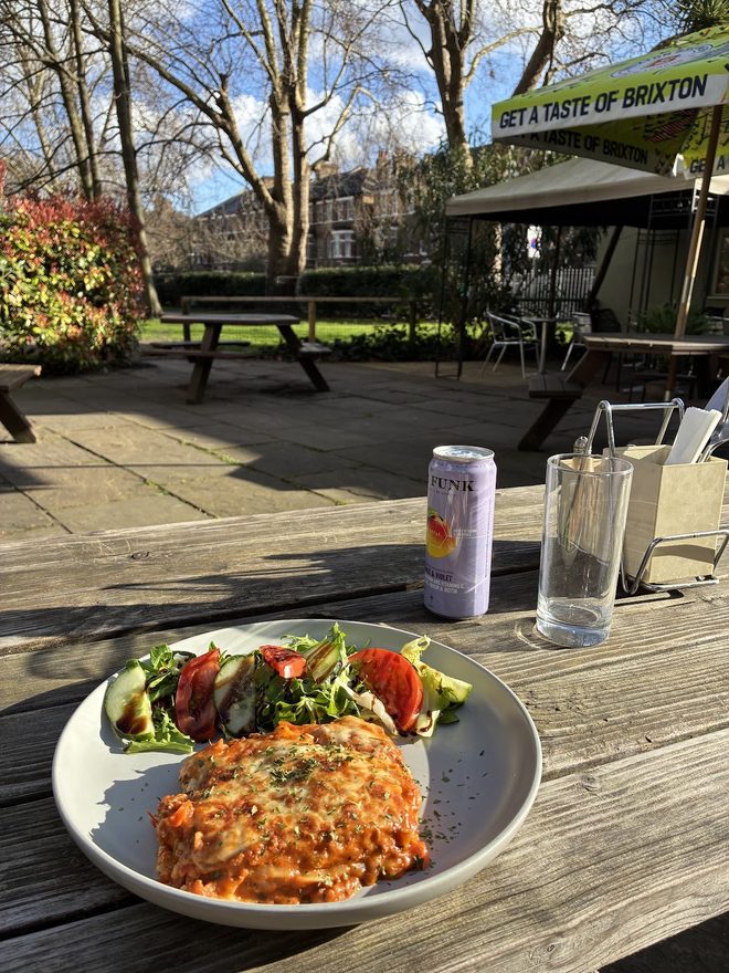 Lunch on a picnic table in the sunny garden