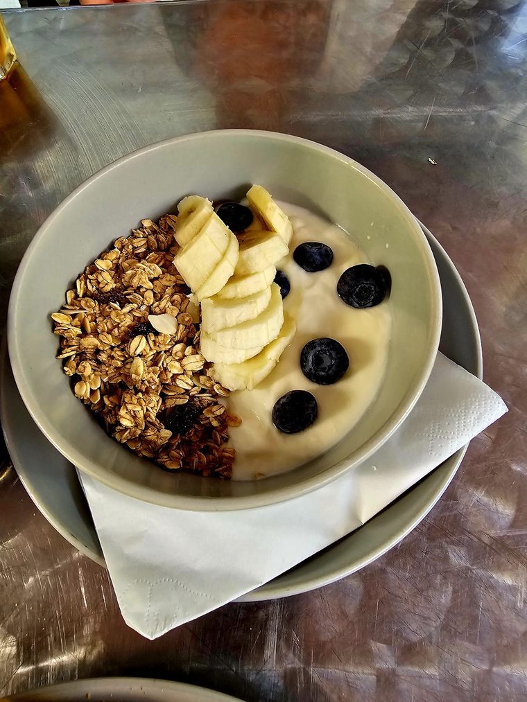 Granola bowl with yoghurt, banana and blueberries